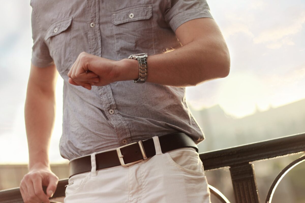 attractive businessman busy clock