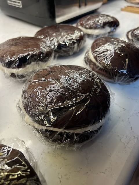 A batch of freshly made whoopie pies wrapped in clear cellophane